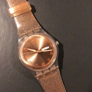 Rose gold swatch watch